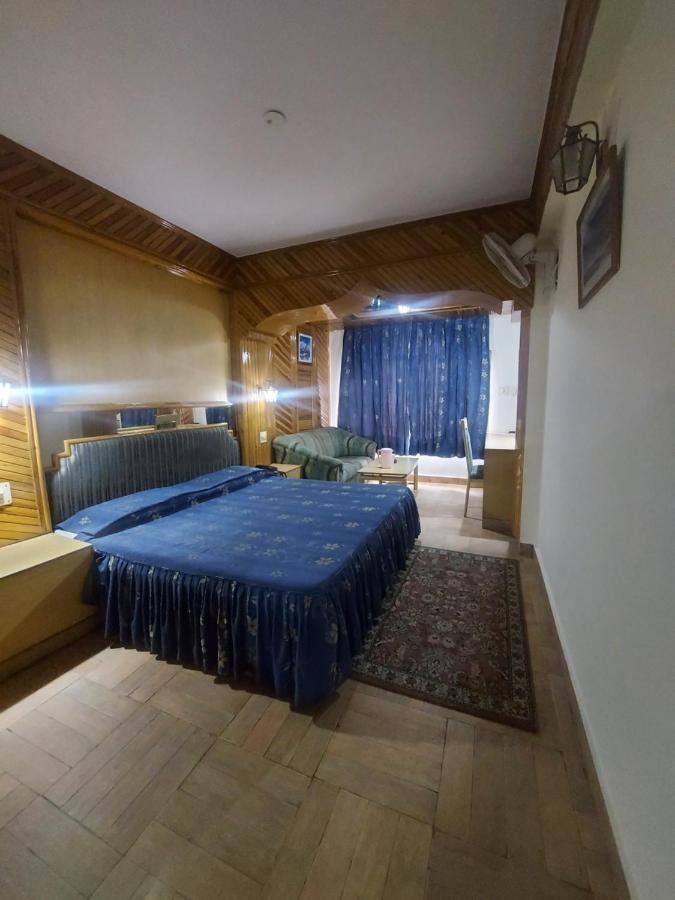 Brightland Hotel Shimla Buitenkant foto