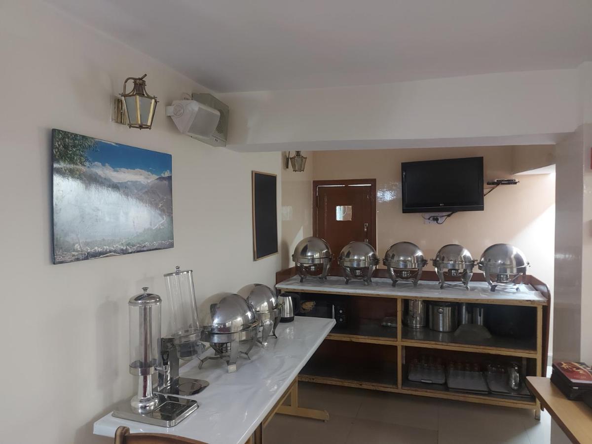 Brightland Hotel Shimla Buitenkant foto