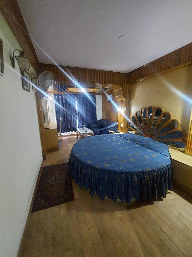 Brightland Hotel Shimla Buitenkant foto
