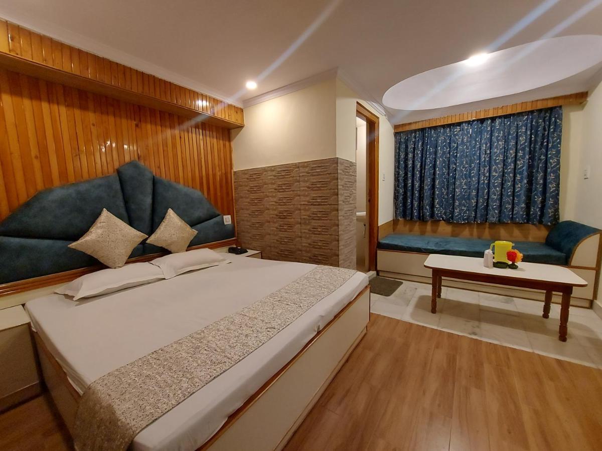 Brightland Hotel Shimla Buitenkant foto