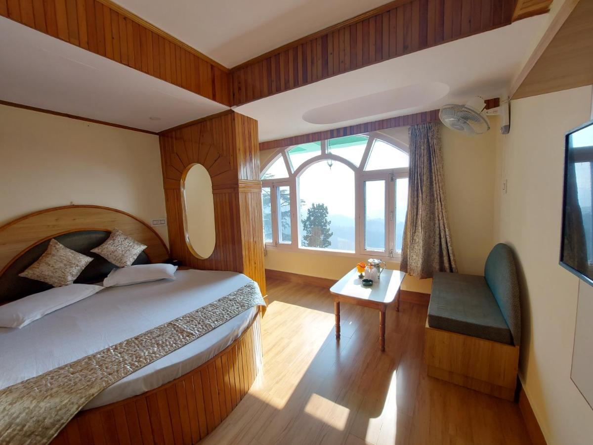 Brightland Hotel Shimla Buitenkant foto