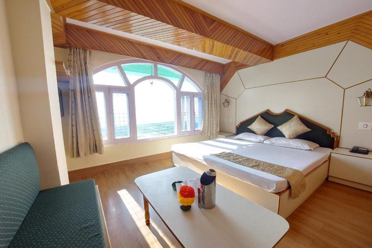Brightland Hotel Shimla Buitenkant foto